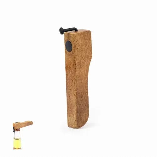 A wooden bottle opener with a metal lever, featuring a smooth, natural finish. It has a rustic design and a small logo. Clasinger - Image 1