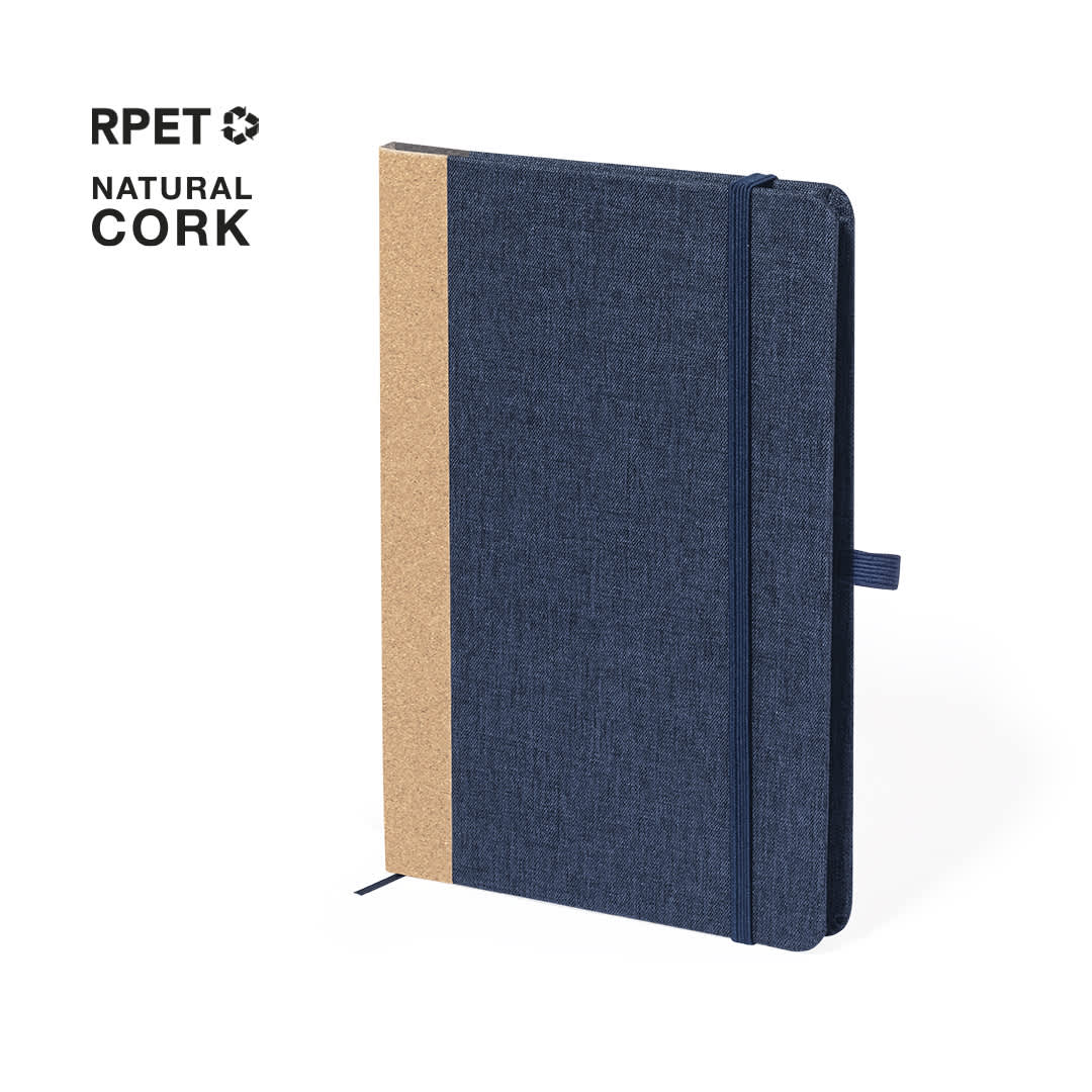 A navy blue notebook with a natural cork design, featuring a logo and a ribbon bookmark. Andrik Notepad - Image 1