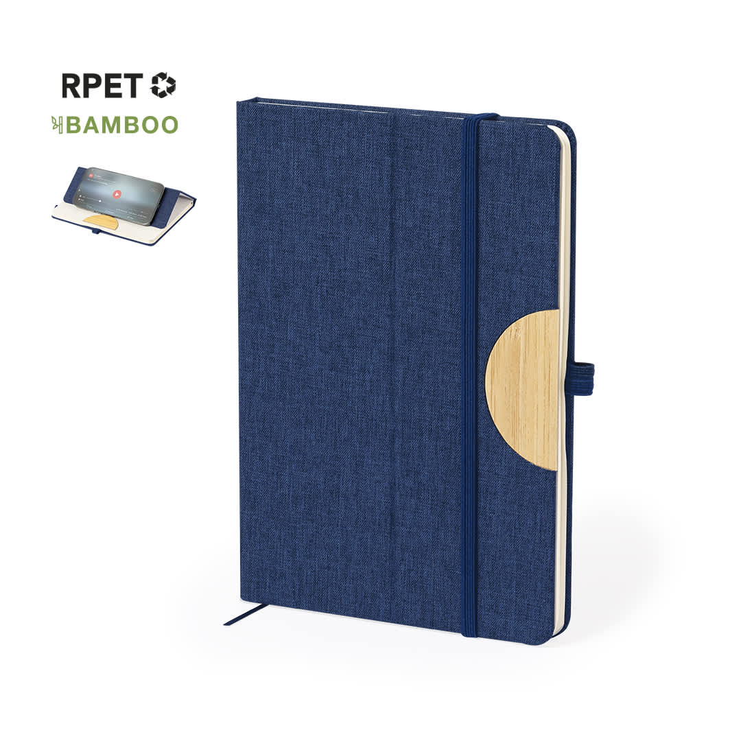 A navy notebook with a bamboo accent, featuring a band and a pocket for storing cards. It has a logo on the cover. Jibs Holder Notepad - Image 1