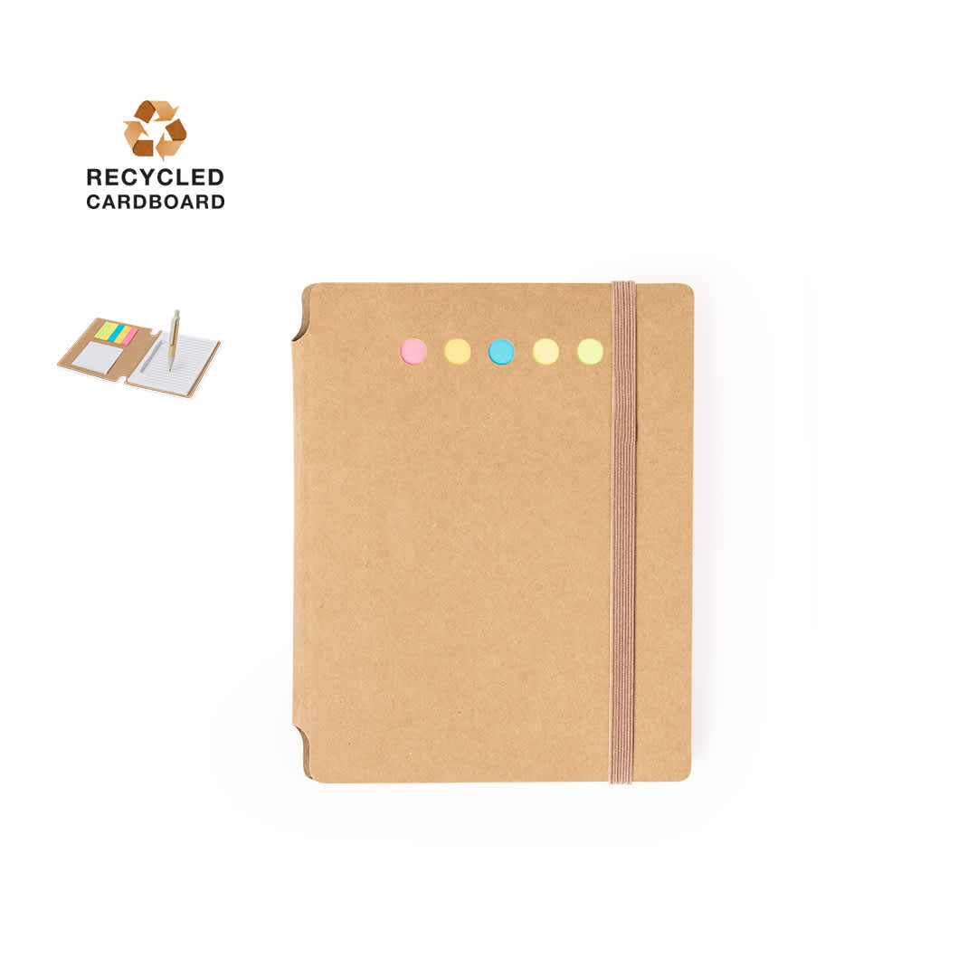A notepad made from recycled cardboard, featuring a brown cover and colourful dots along the top. It has an elastic band closure. Wombax Sticky Notepad - Image 1
