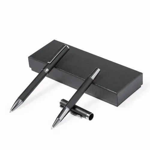 A set of two black pens displayed on a sleek black box. The pens have a stylish design and chrome accents. Okonel - Image 1