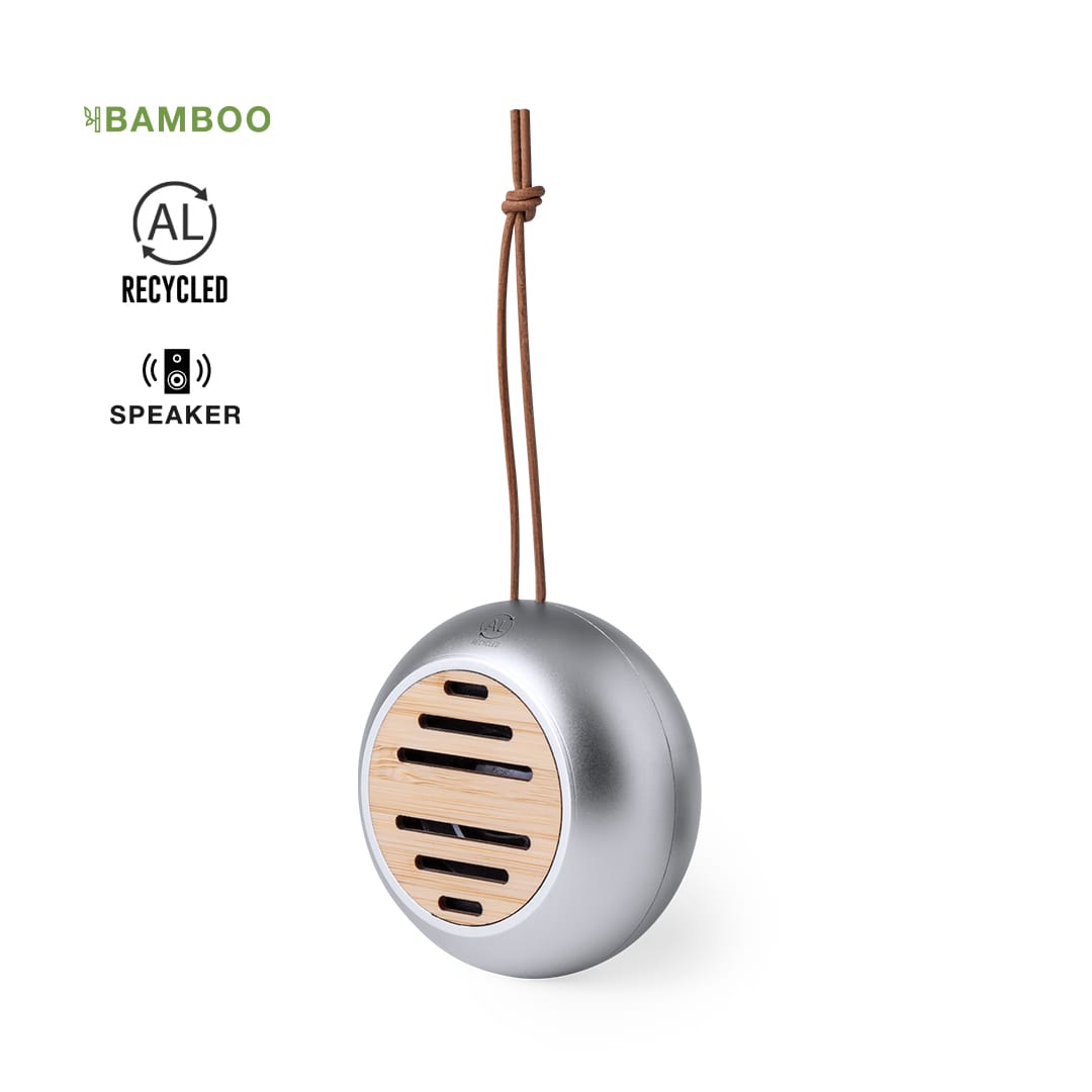 A round, silver speaker with bamboo detail, featuring a leather strap for hanging. It includes a logo on the surface. Hiwent Speaker - Image 1