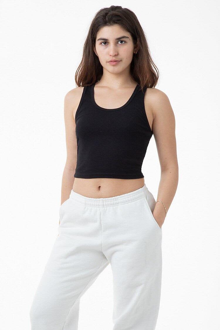 A black 2x1 rib crop tank top paired with white sweatpants, featuring a logo. 2x1 Rib Crop Tank Top - Image 1