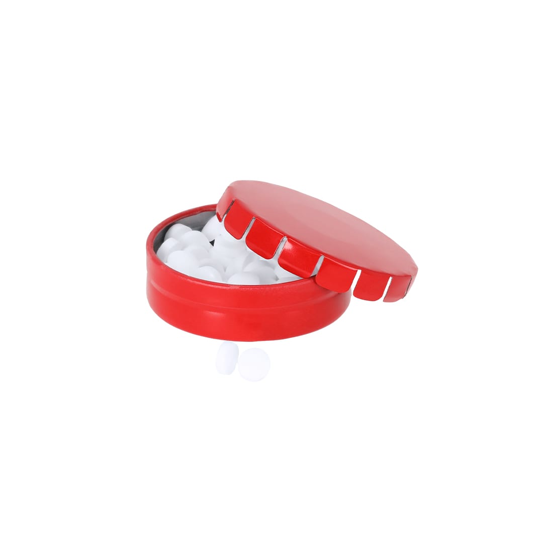 A red candy dispenser containing white mints, with some mints visible both inside and outside the container. Mizzen Candy Dispenser - Image 1
