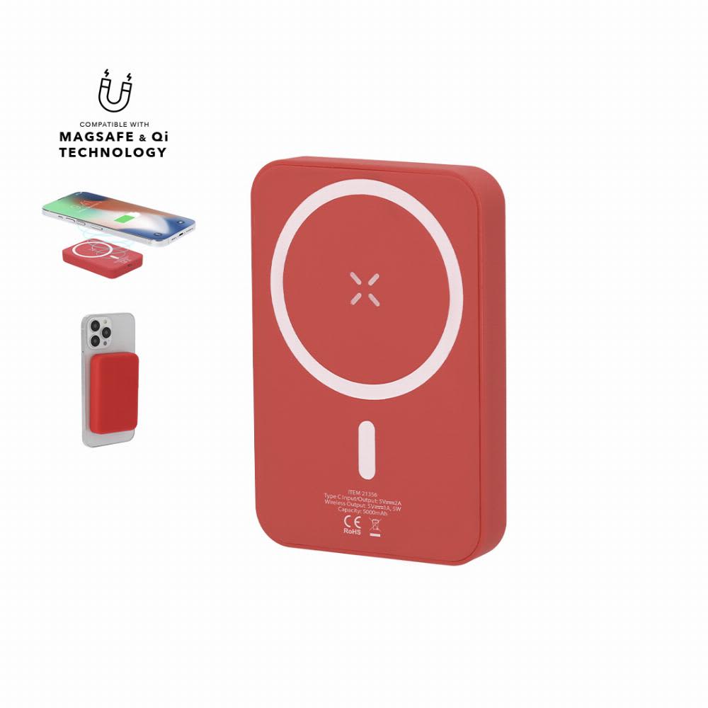 A red magnetic charger with a circular logo, compatible with MagSafe and Qi technology, placed next to a smartphone. Tudelak - Image 1