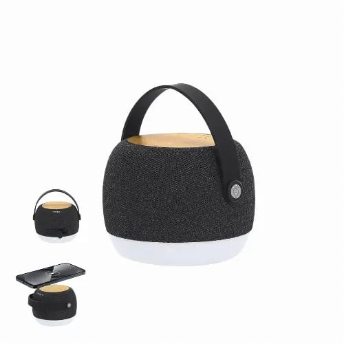 A portable speaker with a textured black fabric exterior, a wooden top, and a white base. It features a convenient handle. Sprit - Image 1