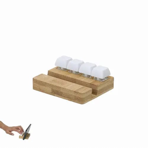 A bamboo charging station with four white charging pads and a wooden base, alongside a hand placing a device on it. Terap - Image 1