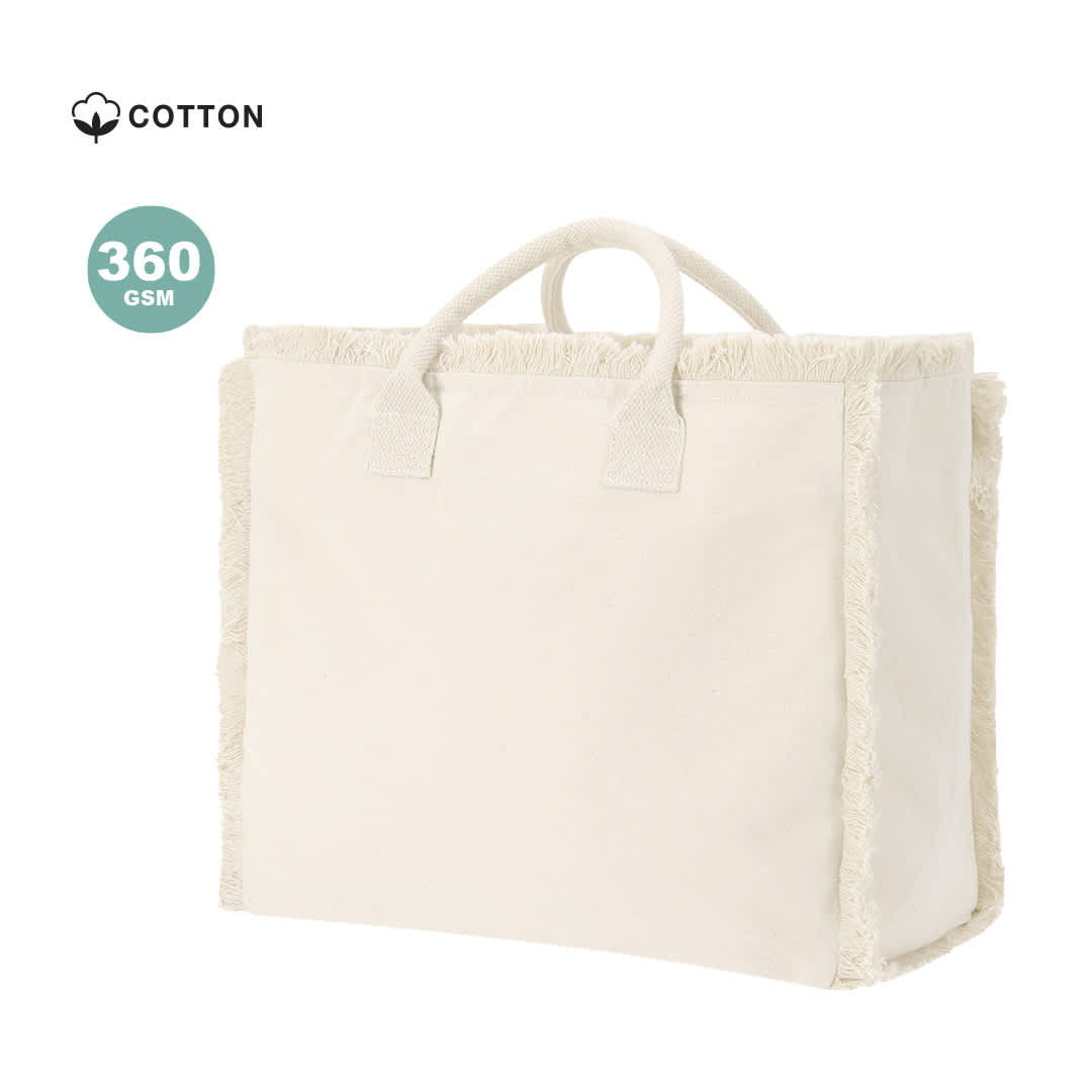 A cream tote bag with textured edges and sturdy handles, featuring a logo on the side. Dinebor Bag - Image 1