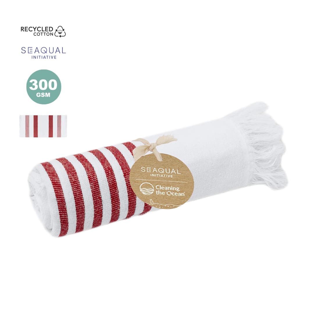 A rolled towel with white and red stripes, made from recycled cotton, featuring a tag with a logo. Mundry Towel Pareo - Image 1