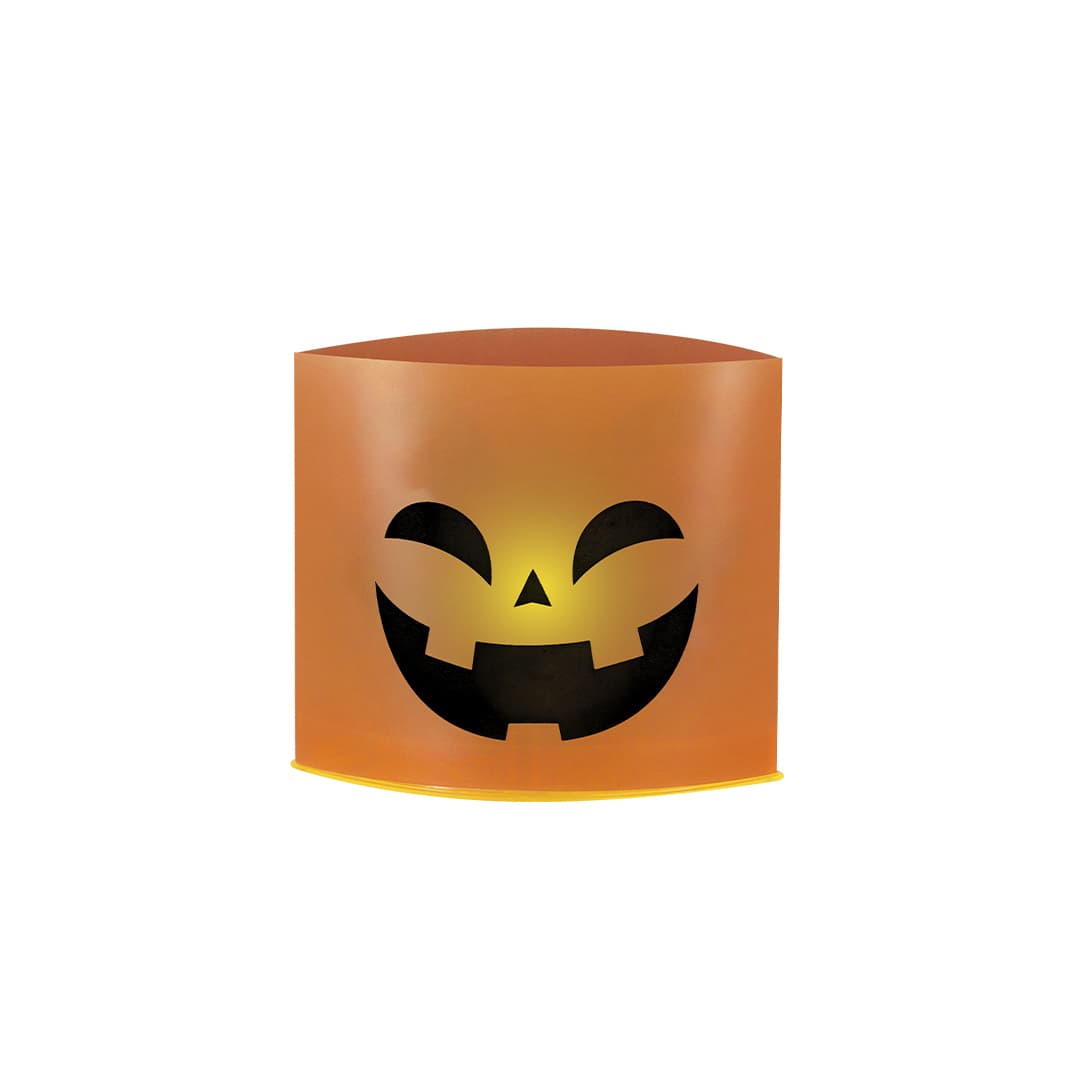 An orange candle holder with a smiling jack-o'-lantern face cut-out, featuring a black design. Turuk Candle - Image 1