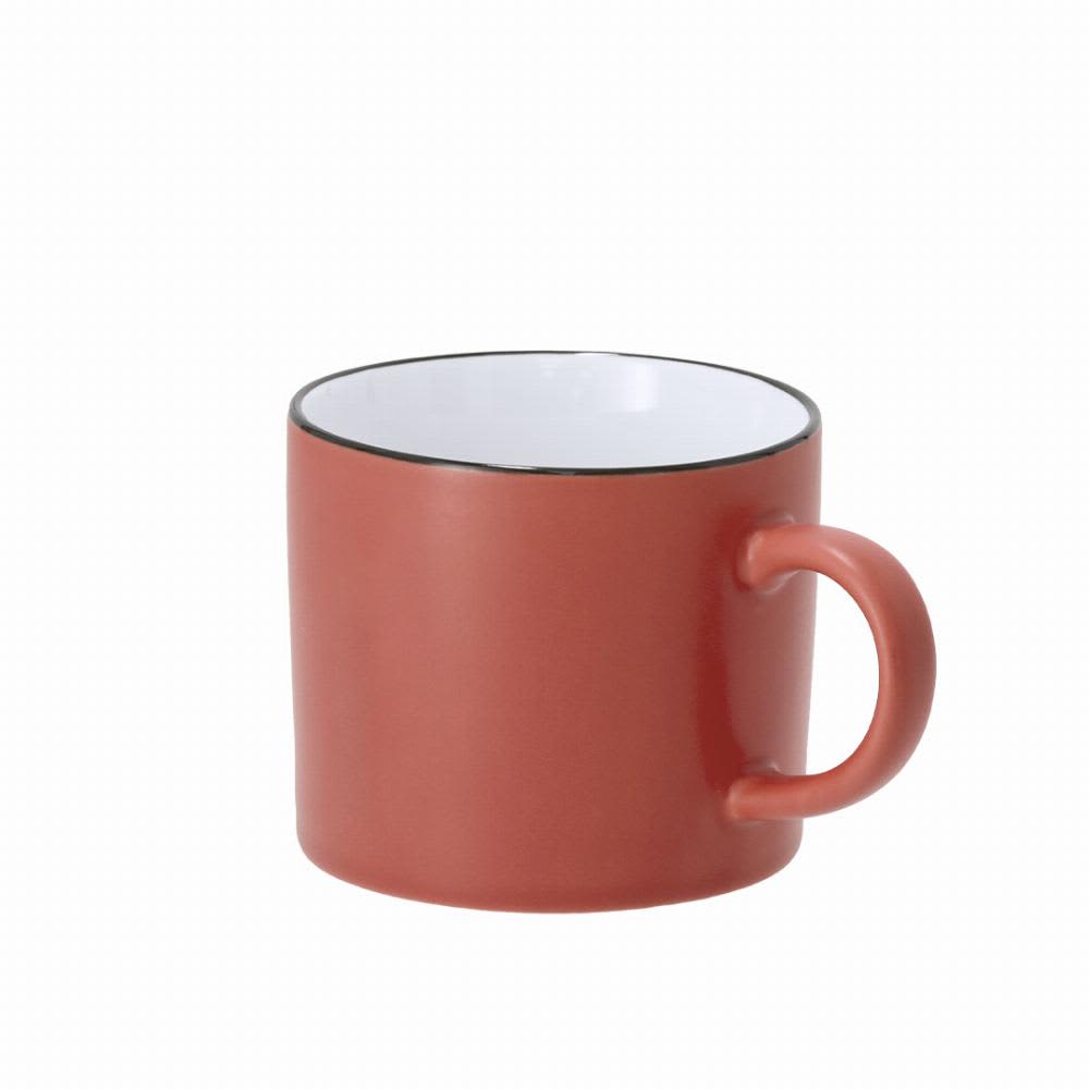 A drink mug in a terracotta colour with a white interior and a black rim, featuring a handle on the side. Dumax - Image 1