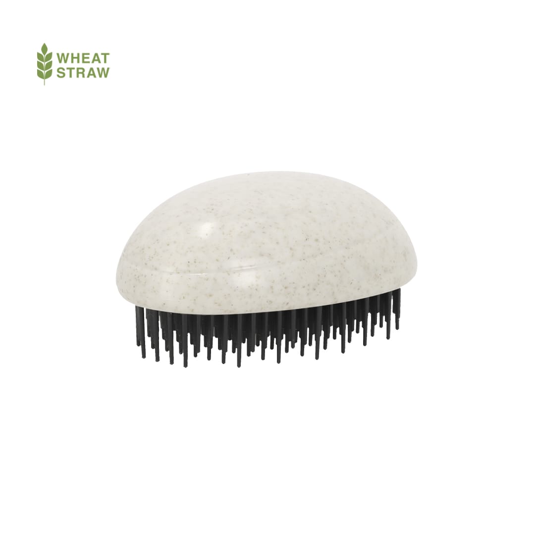 A wheat straw anti-tangle hairbrush in creamy white with black bristles, featuring a smooth ergonomic shape. Nymar Anti-Tangle Hairbrush - Image 1
