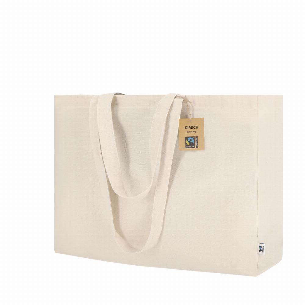 A large, cream-coloured tote bag with two handles and a tag, featuring a simple design. Kimich Fairtrade - Image 1