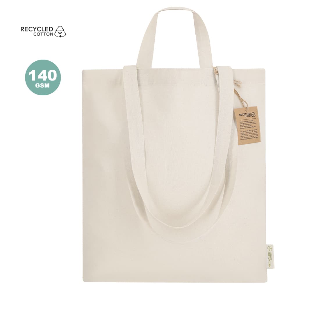 A beige tote bag made from recycled cotton, featuring two handles and a tag. The bag has a branding logo. Drulik Bag - Image 1
