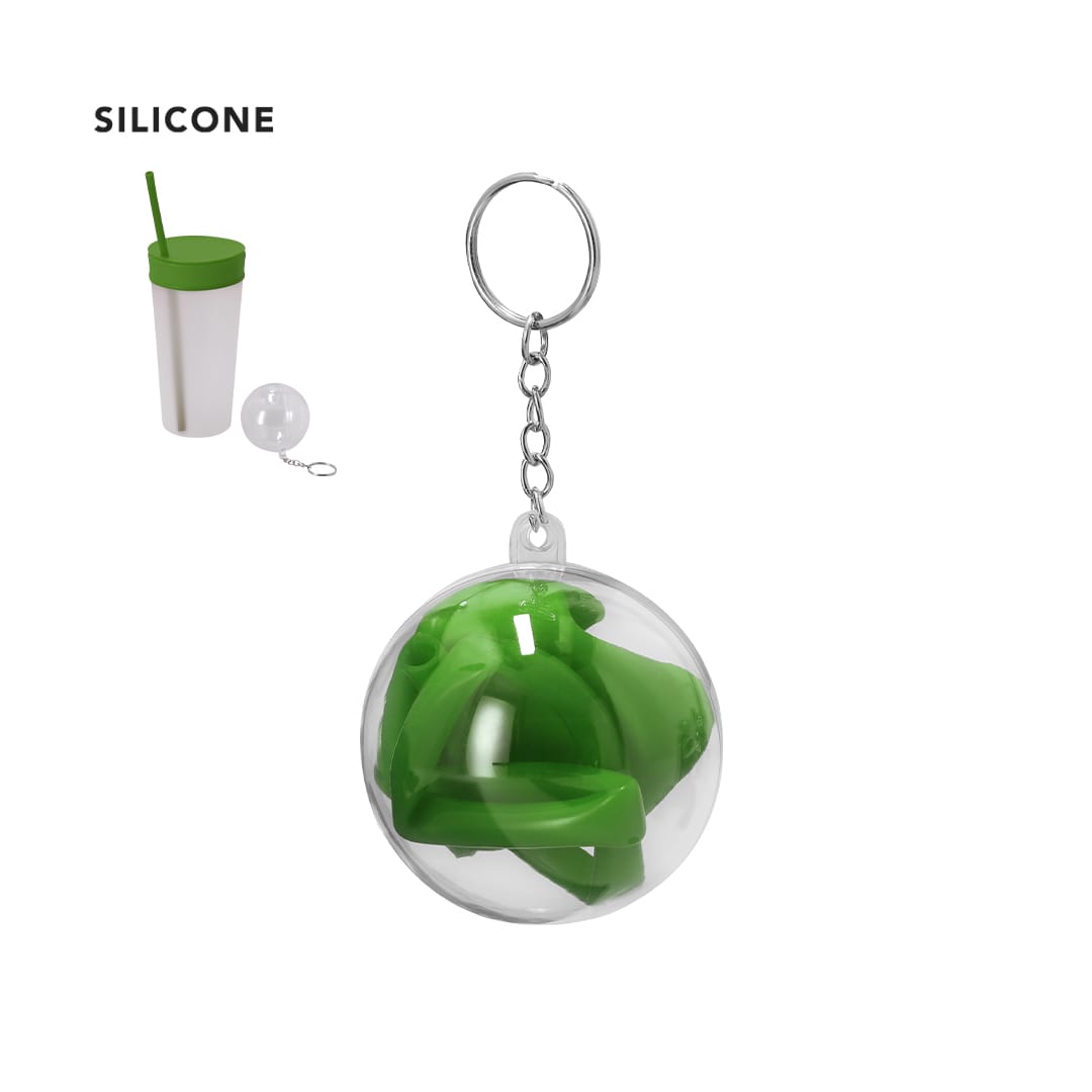 A green silicone cup cover and drinking straw inside a clear ball with a keychain attachment. Mika Cup Cover - Image 1