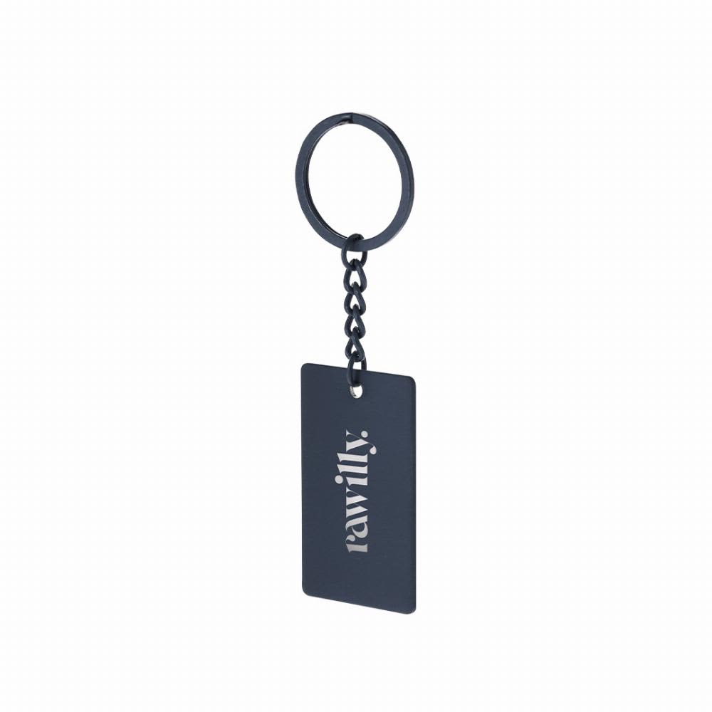 A keyring featuring a rectangular tag in a dark colour with a chain attachment and a logo. Taraf - Image 1