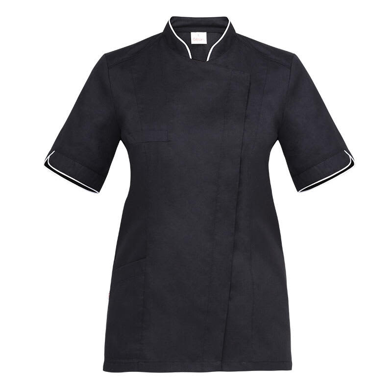 A black chef tunic with short sleeves, featuring a stylish wrap design and contrasting trim. It includes a front pocket and branding. Tania Tunic - Image 1