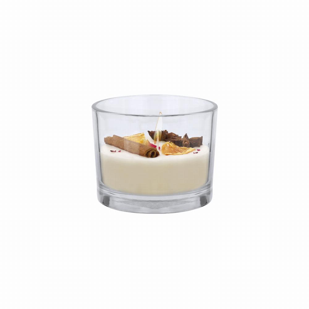A candle in a clear glass holder, featuring a creamy white wax base with cinnamon sticks and dried fruit decorations. Dempsey - Image 1