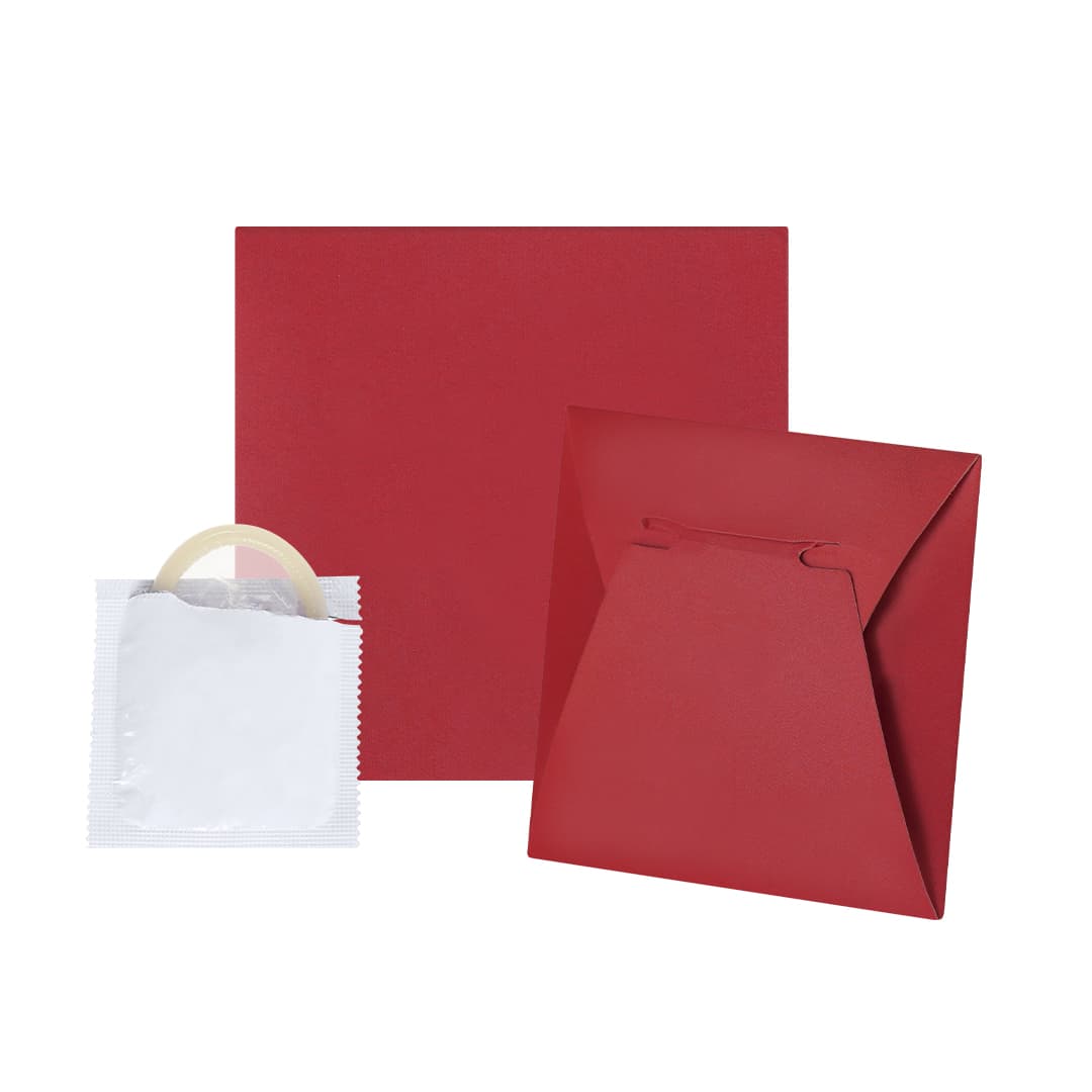 A red envelope and a red packet containing a condom. The packet is white with a clear seal. Qibarni Condom - Image 1