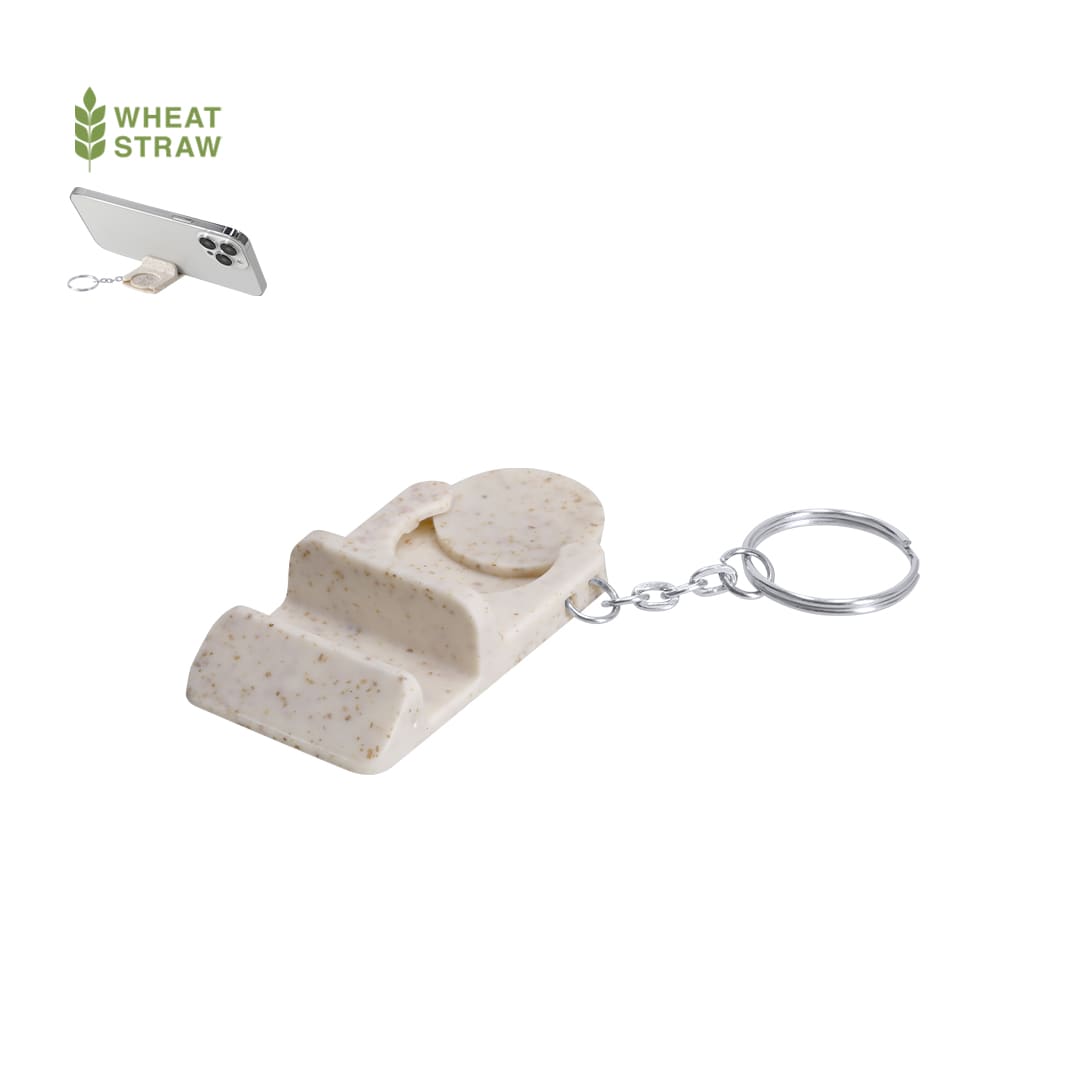 A beige keyring coin holder made from wheat straw, featuring a circular coin compartment and a chain attachment. Lansan Holder Keyring Coin - Image 1