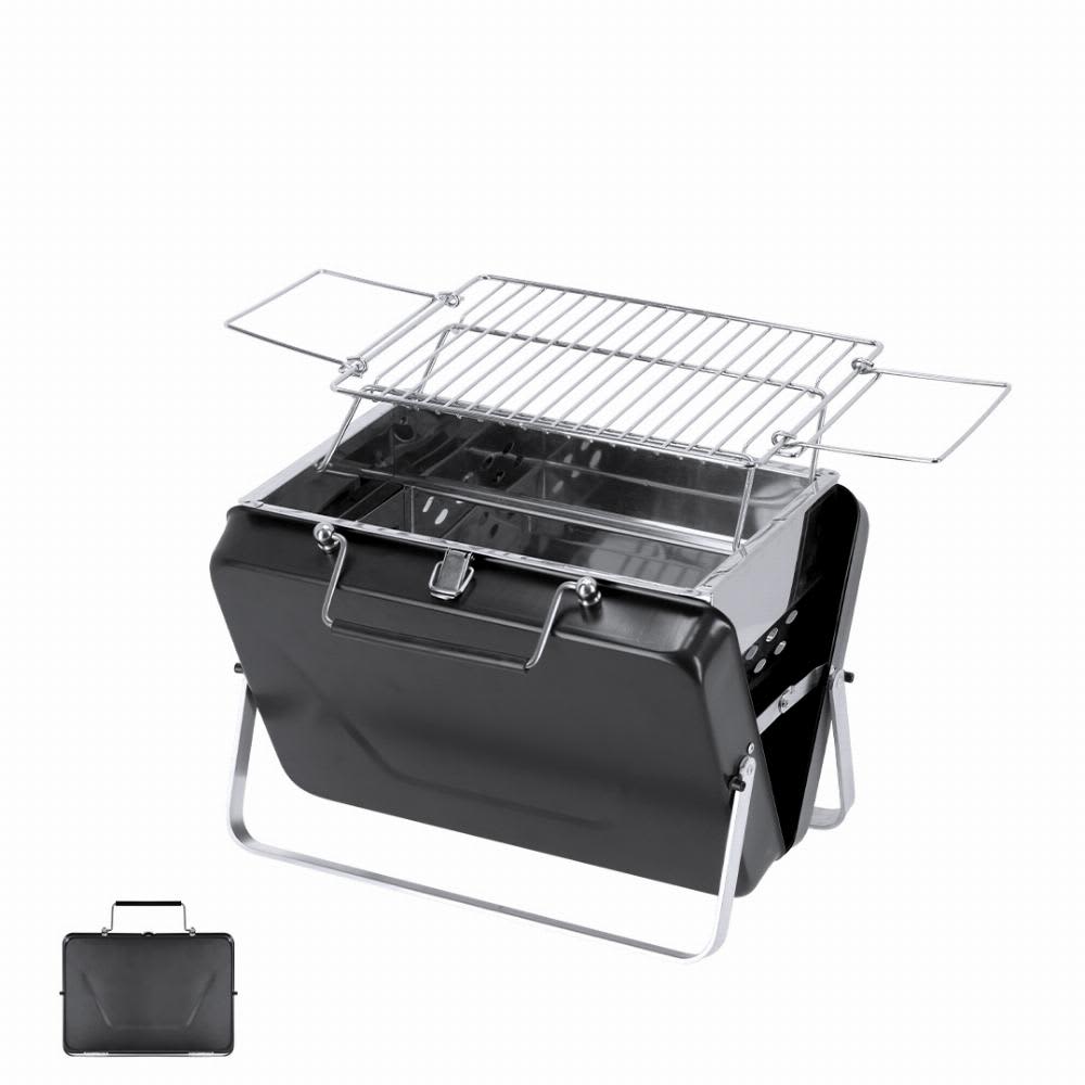 A portable charcoal barbecue grill in black, featuring a chrome grilling rack and a compact foldable design. Magnol - Image 1