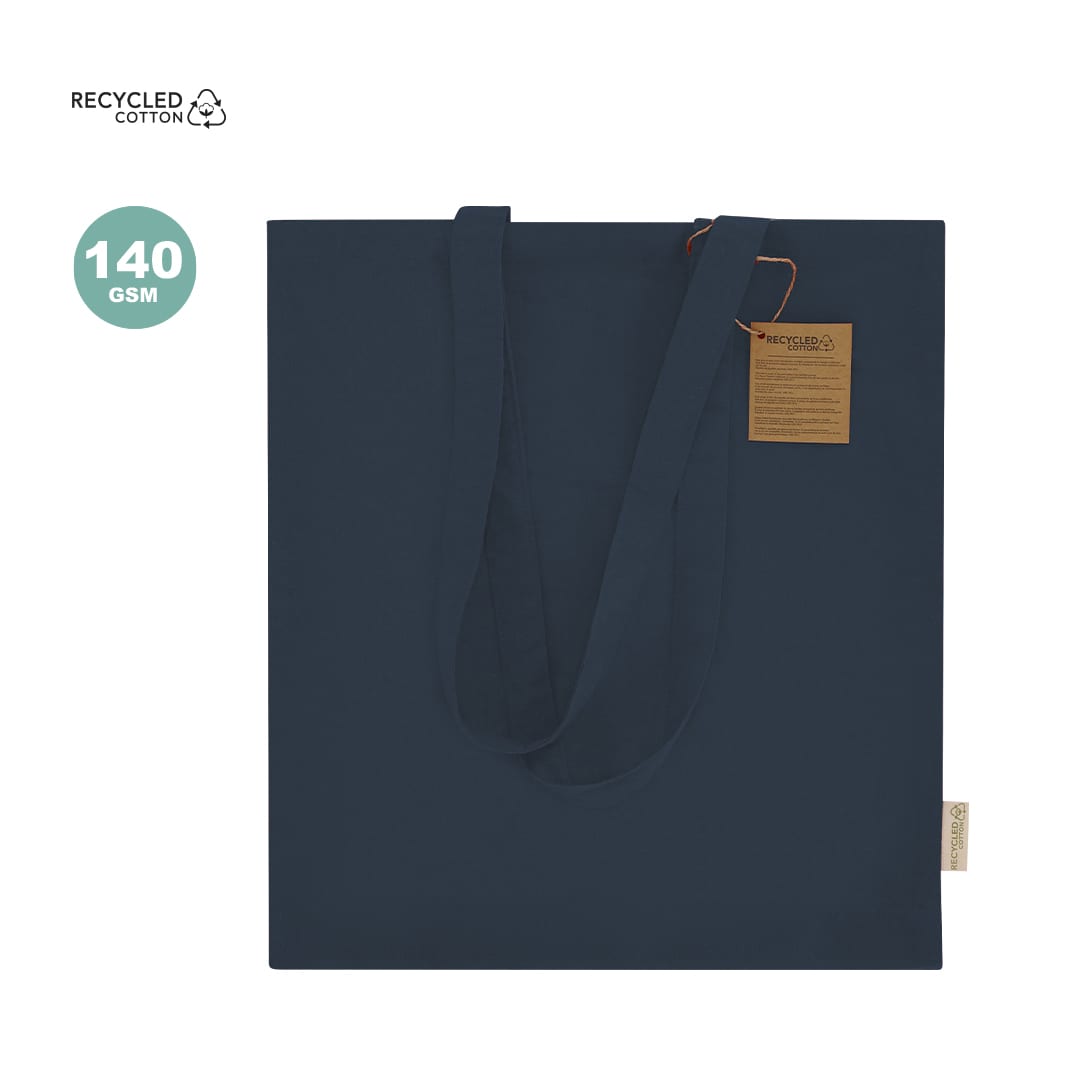 A navy blue tote bag made from recycled cotton with shoulder straps and a hang tag. It features a logo. Lovarin Bag - Image 1
