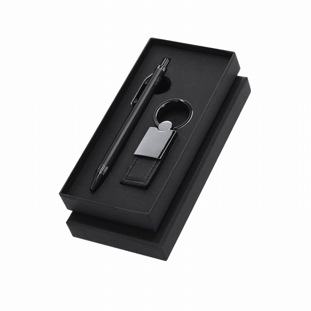 A gift set featuring a black pen, keyring, and leather tag, presented in a black box. Tobyan - Image 1