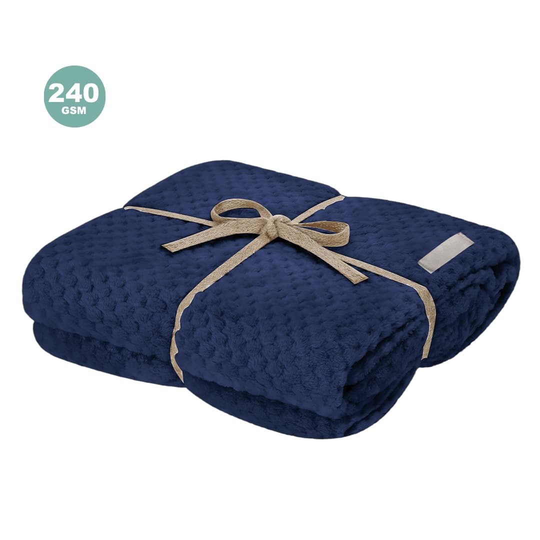 A navy blue Iridian blanket, tied with a ribbon, featuring a textured design. It has a branding logo on it. Iridian Blanket - Image 1