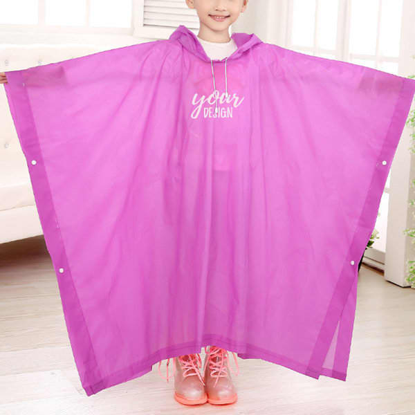 A children’s rain poncho in bright pink, featuring a hood and a logo, designed with snap closures on the sides. EVA Children Rain Poncho - Image 1