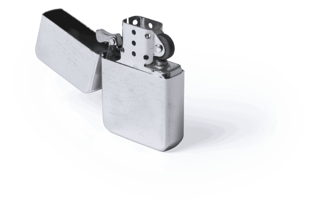 A silver lighter with a flip-top design, featuring a textured surface and a circular ignition mechanism. Deuston Lighter - Image 1