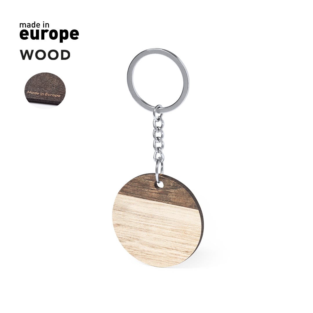 A wooden keyring with a circular design, featuring two tones of wood and a metal chain and ring. Ciran Keyring - Image 1