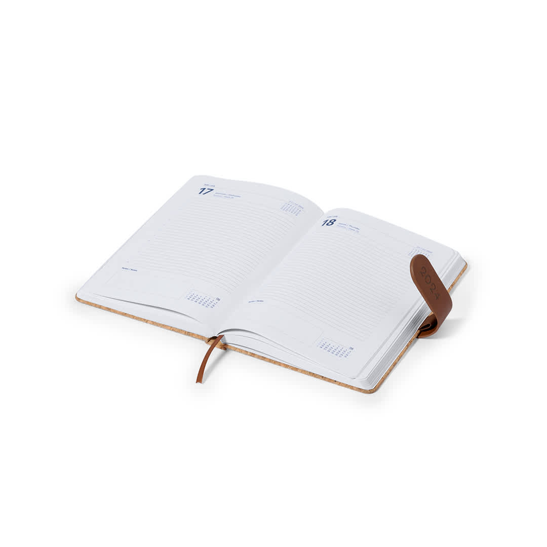 An open diary with blank pages, featuring a brown leather strap and a simple, elegant design. Flinex Diary - Image 1