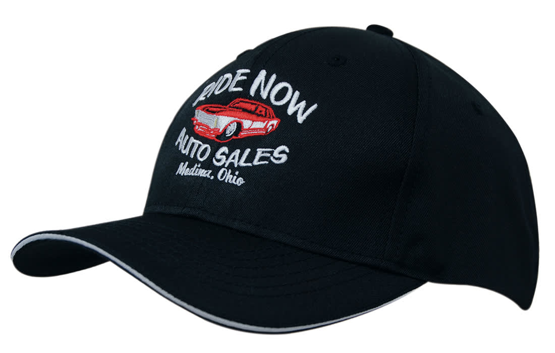 A black cap featuring embroidery of a car and text, with sandwich trim on the visor. It has a logo on the front. Breathable Poly Twill with Sandwich Trim - Image 1