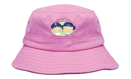 A pink infants bucket hat with a logo featuring cartoon characters. It has a classic wide brim design. Brushed Sports Twill Infants Bucket Hat - Image 1