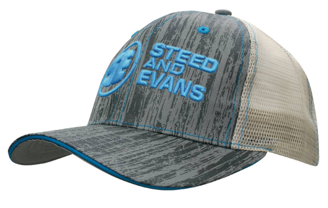 A grey and blue cap with a mesh back and a logo on the front. The design features a textured appearance. Wood Printed With Mesh Back - Image 1