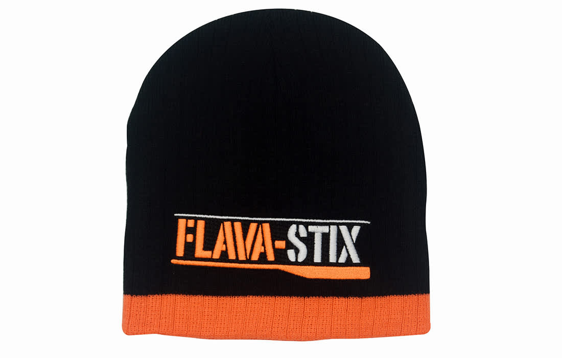 A black and orange two-tone cable knit beanie with a logo on the front. Two Tone Cable Knit Beanie - Toque - Image 1