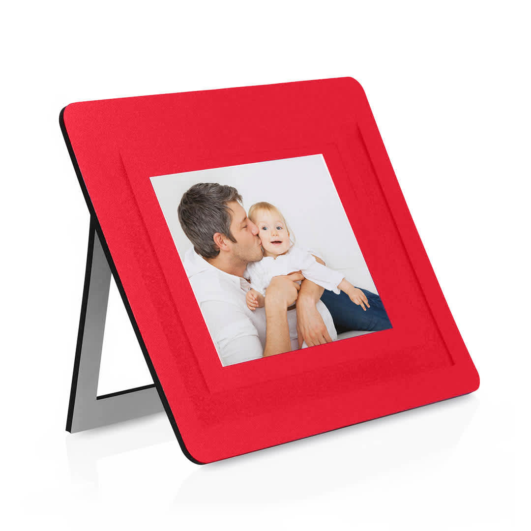 A red mousepad photo frame featuring a photo of a person with a child, displaying an upright support. Pictium Mousepad Photo Frame - Image 1