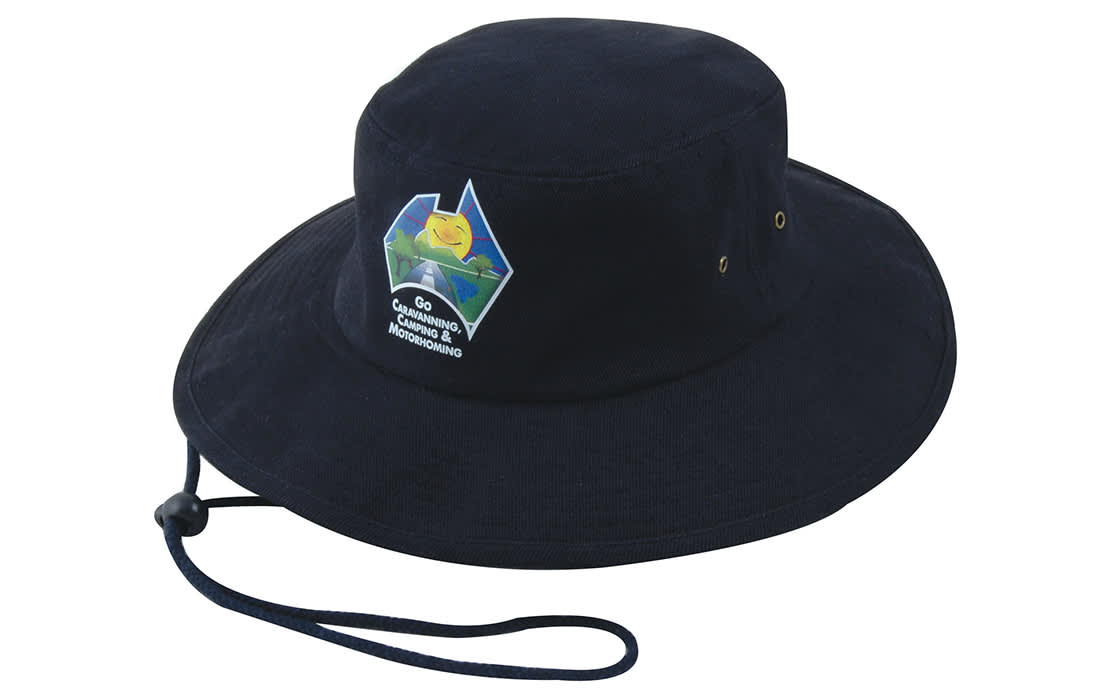 A navy blue brushed heavy sports twill hat featuring a logo and an adjustable chin strap. Brushed Heavy Sports Twill Hat - Image 1