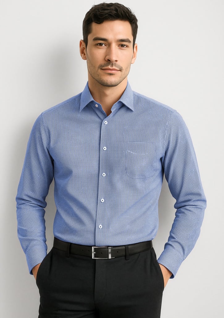 A men’s long sleeve button-up shirt in light blue, featuring a chest pocket and a logo. Mens Newport Long Sleeve Shirt - Image 1