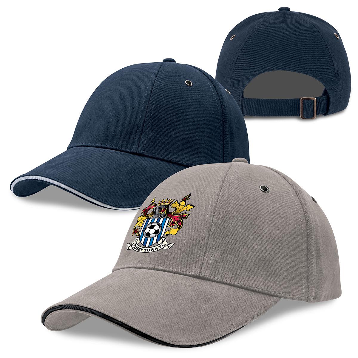 A grey and navy cap with a logo, featuring a curved brim and adjustable strap at the back. Rotated Sandwich Peak Cap - Image 1