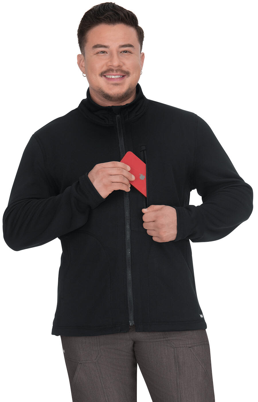 A man wears a black jacket with a zippered front, holding a red item in his hand. The jacket features a logo. Reactivate Jacket - Image 1