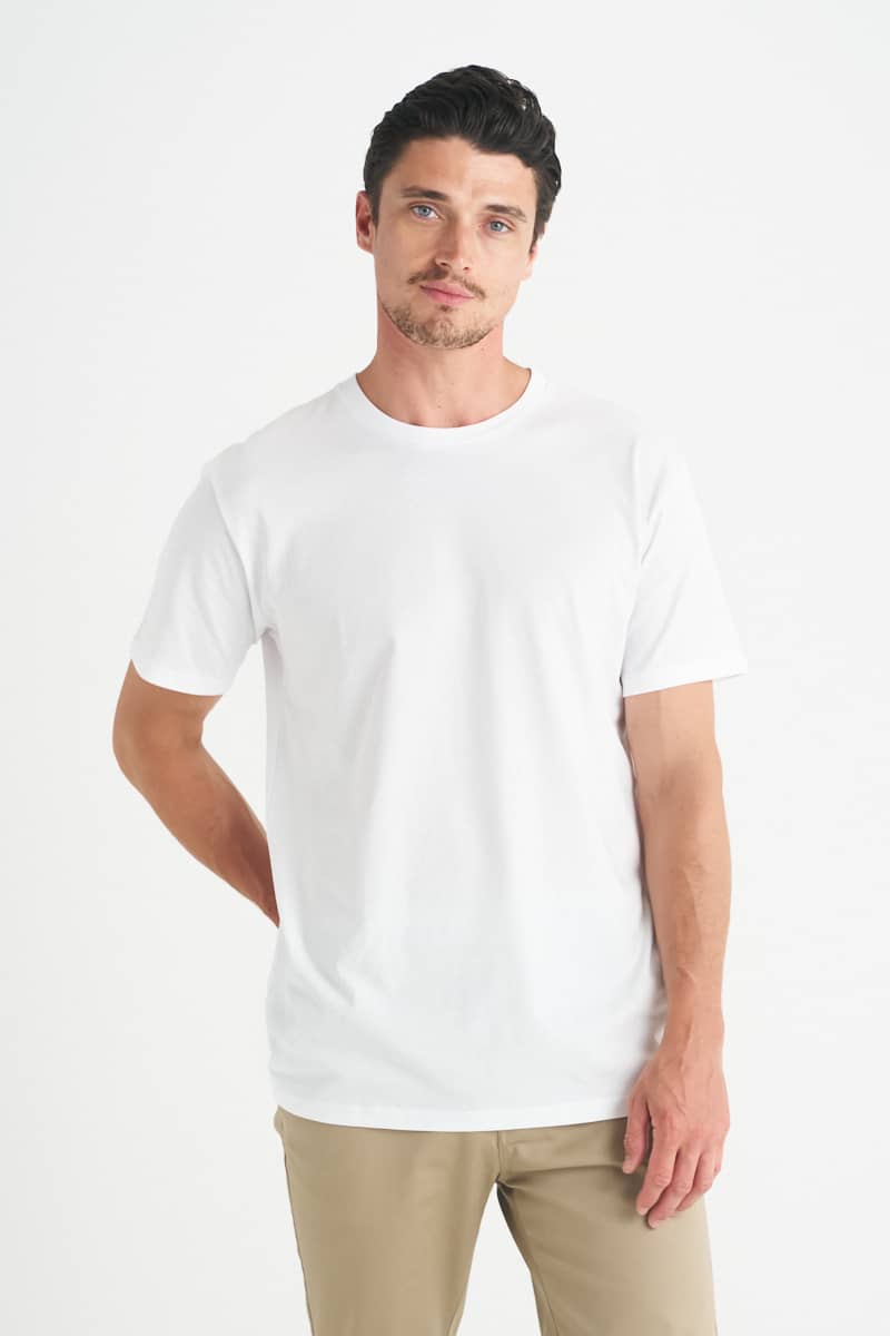 A white men's t-shirt displayed on a model, with a plain design and no visible branding. Benny - Mens T-Shirt - Image 1