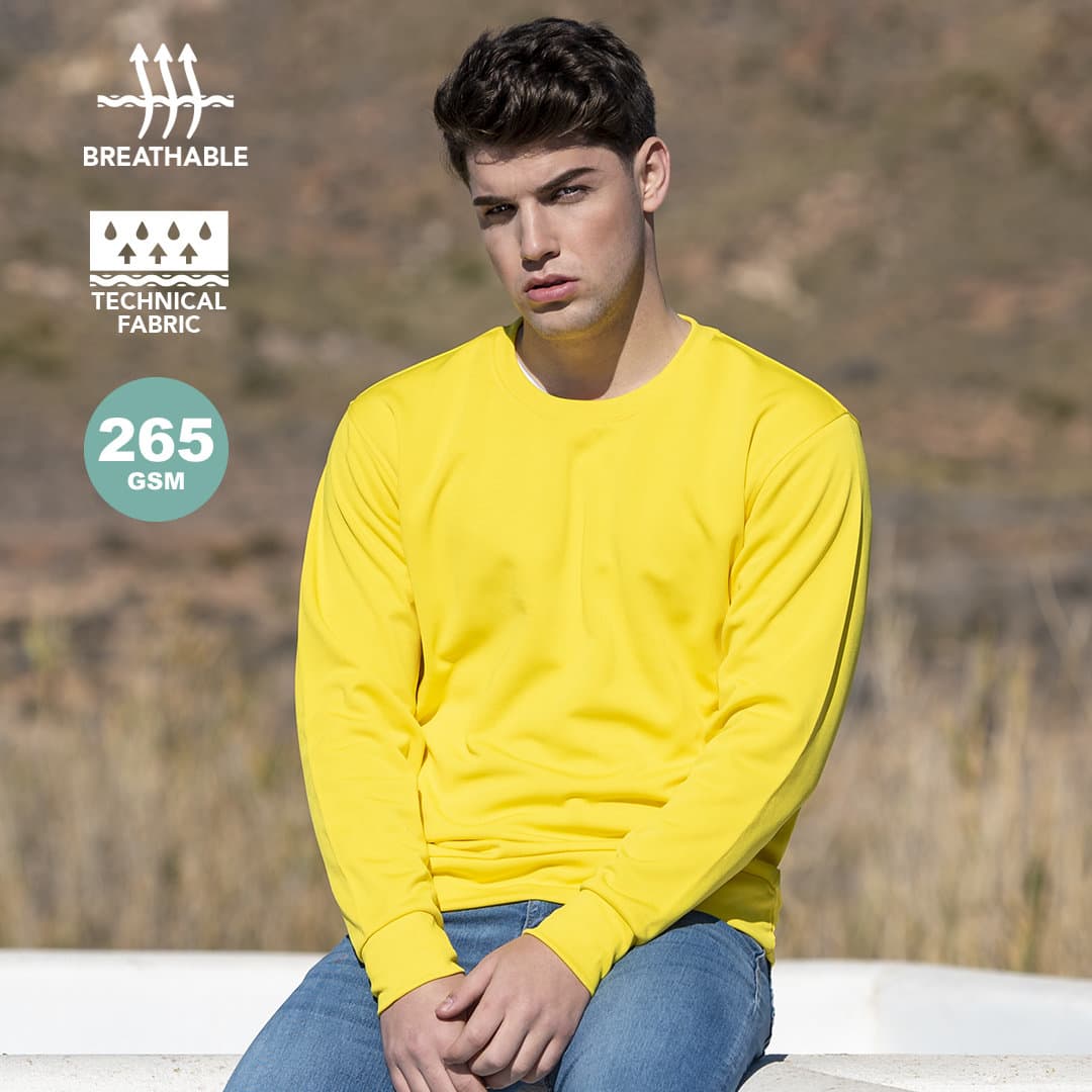 A yellow technical sweatshirt featuring long sleeves, made from breathable fabric, with a fitted design. Kroby Adult Technical Sweatshirt - Image 1