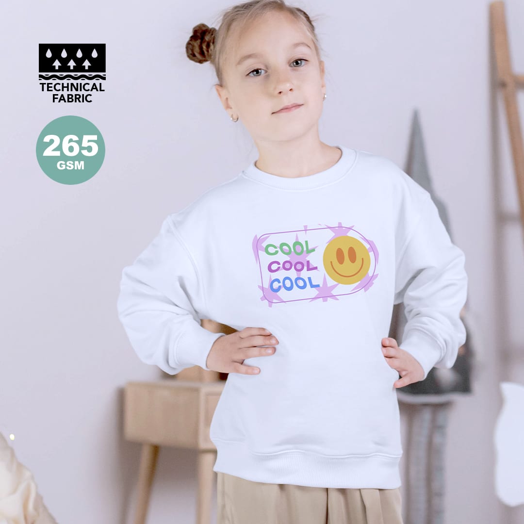 A white sweatshirt with a playful graphic design featuring a smiley face. It has a logo and is made from technical fabric. Kroby Kids Technical Sweatshirt - Image 1