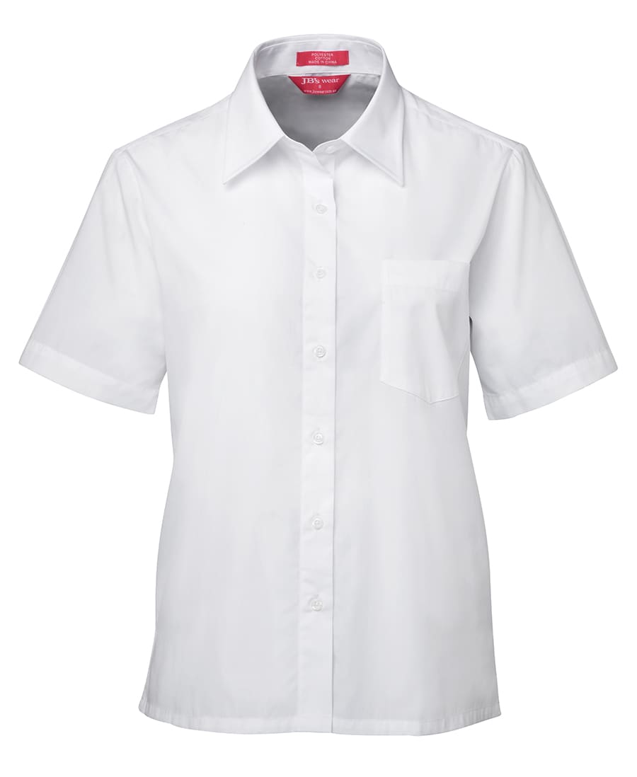 A white short-sleeve button-up shirt with a left chest pocket and collar, featuring a logo. JB's Ladies S/S Original Poplin Shirt - Image 1