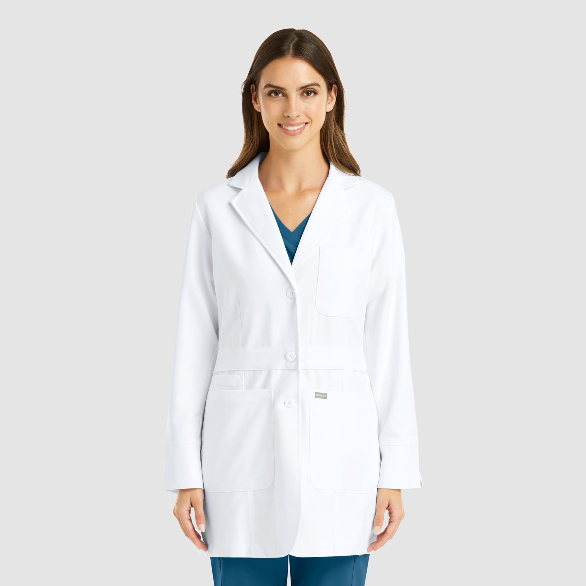 A white mid-length lab coat with a pocket, featuring long sleeves and a button closure, worn by a smiling woman. Momentum Womens Mid Length Lab Coat (32") - Image 1