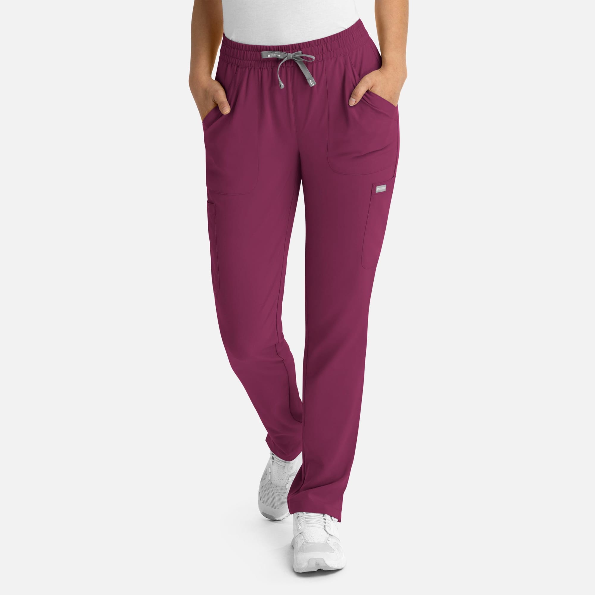 A pair of women's full elastic pull-on pants in a rich plum colour, featuring pockets and a drawstring waistband. Momentum Womens Full Elastic Pull on Pant - Image 1