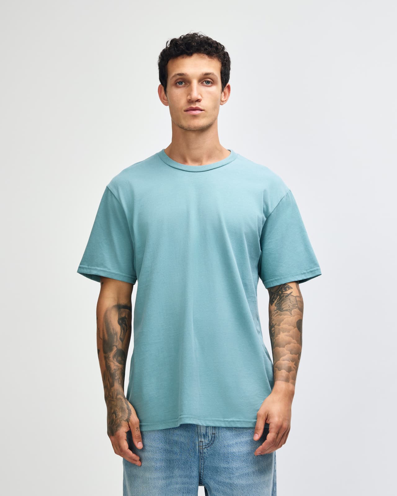 A sueded unisex short sleeve t-shirt in a soft blue colour, featuring a relaxed fit and a visible logo. American Apparel Sueded Unisex Short Sleeve T-shirt - Image 1