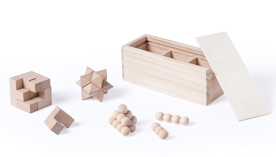 A wooden puzzle set featuring various geometric shapes, with a rectangular storage box and natural wood finish. Genium - Image 1