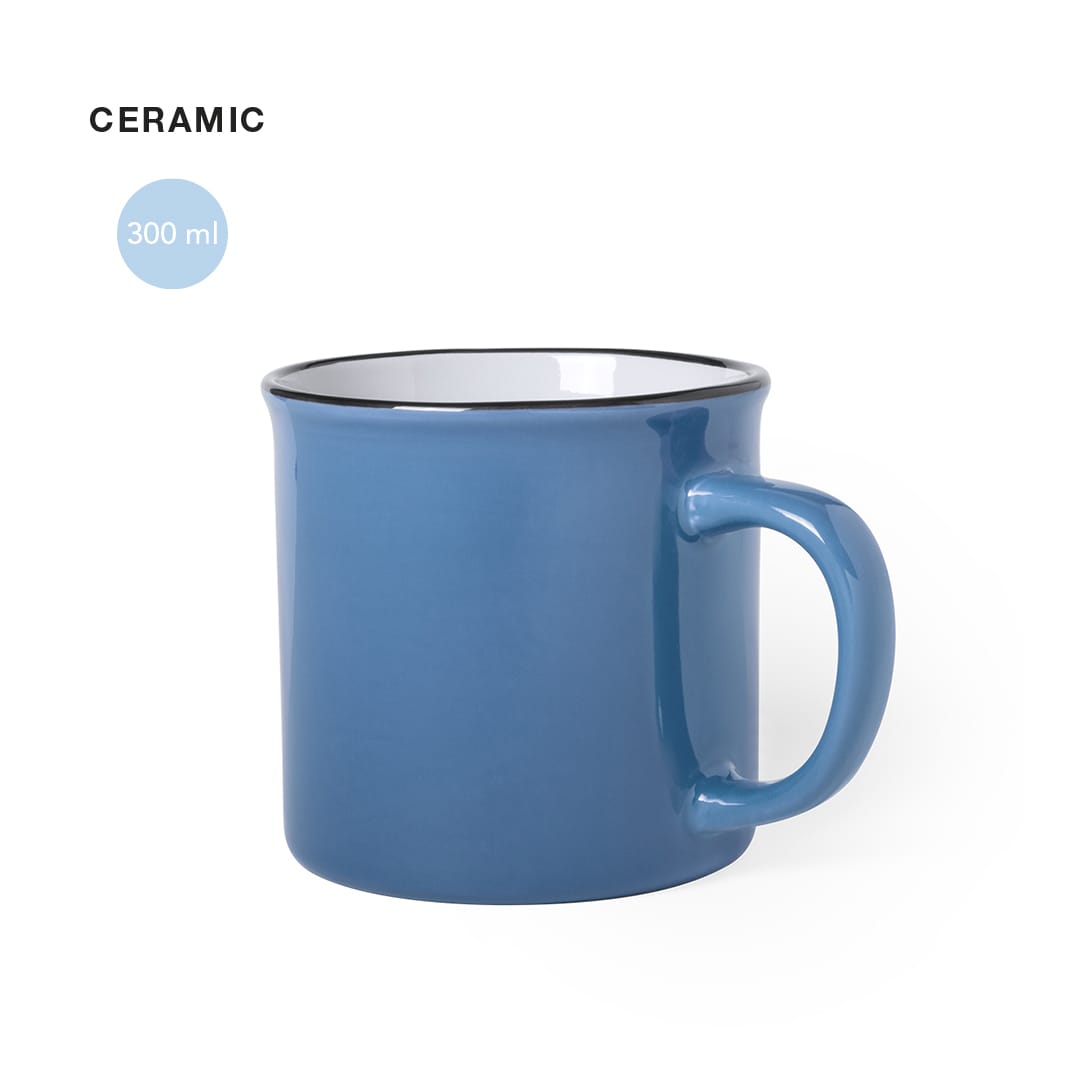 A ceramic coffee mug in blue with a contrasting white interior, featuring a curved handle. Holds 300 ml. Sinor Mug - Image 1